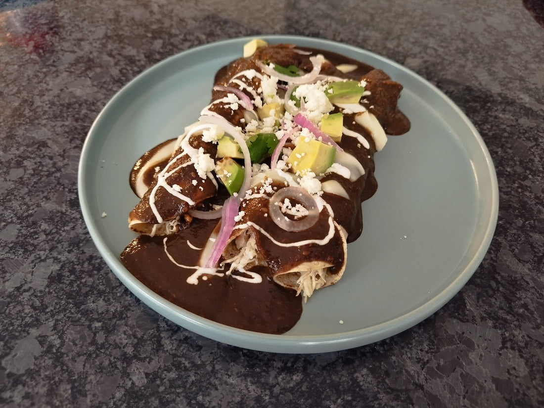 Enmoladas (chicken mole enchiladas)