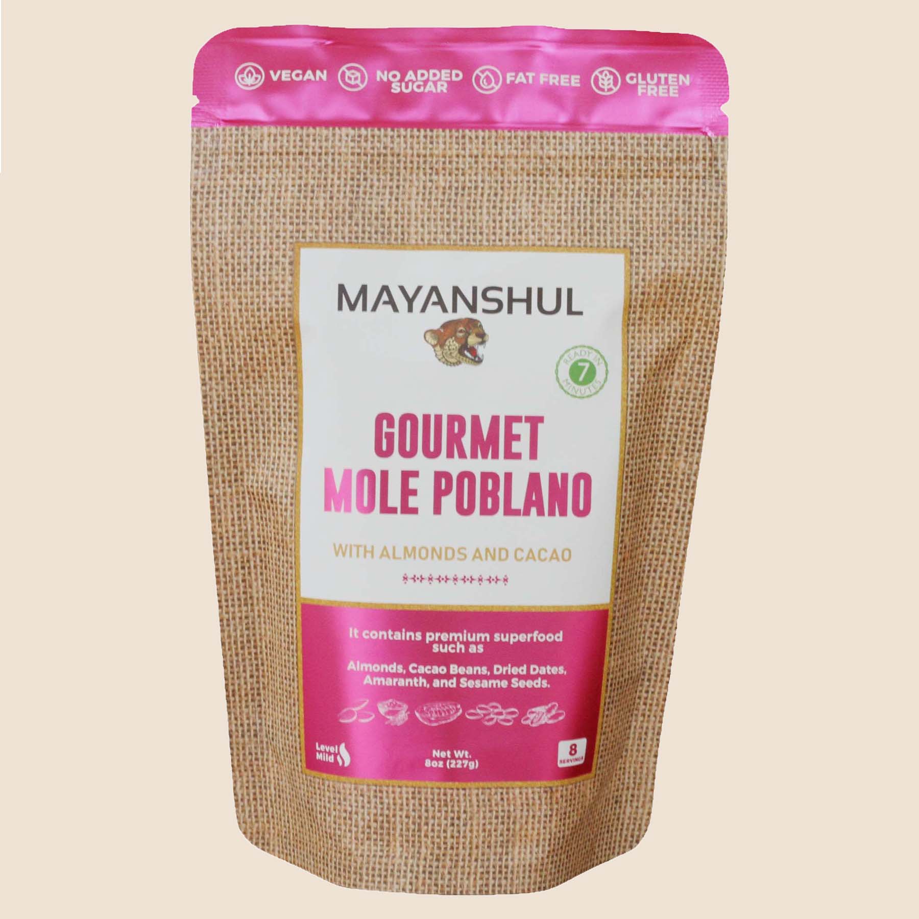 A package of Mayanshul Gourmet Mole Poblano with almonds and cacao, labeled vegan, no added sugar, fat, dairy, and artificial colors or flavors.