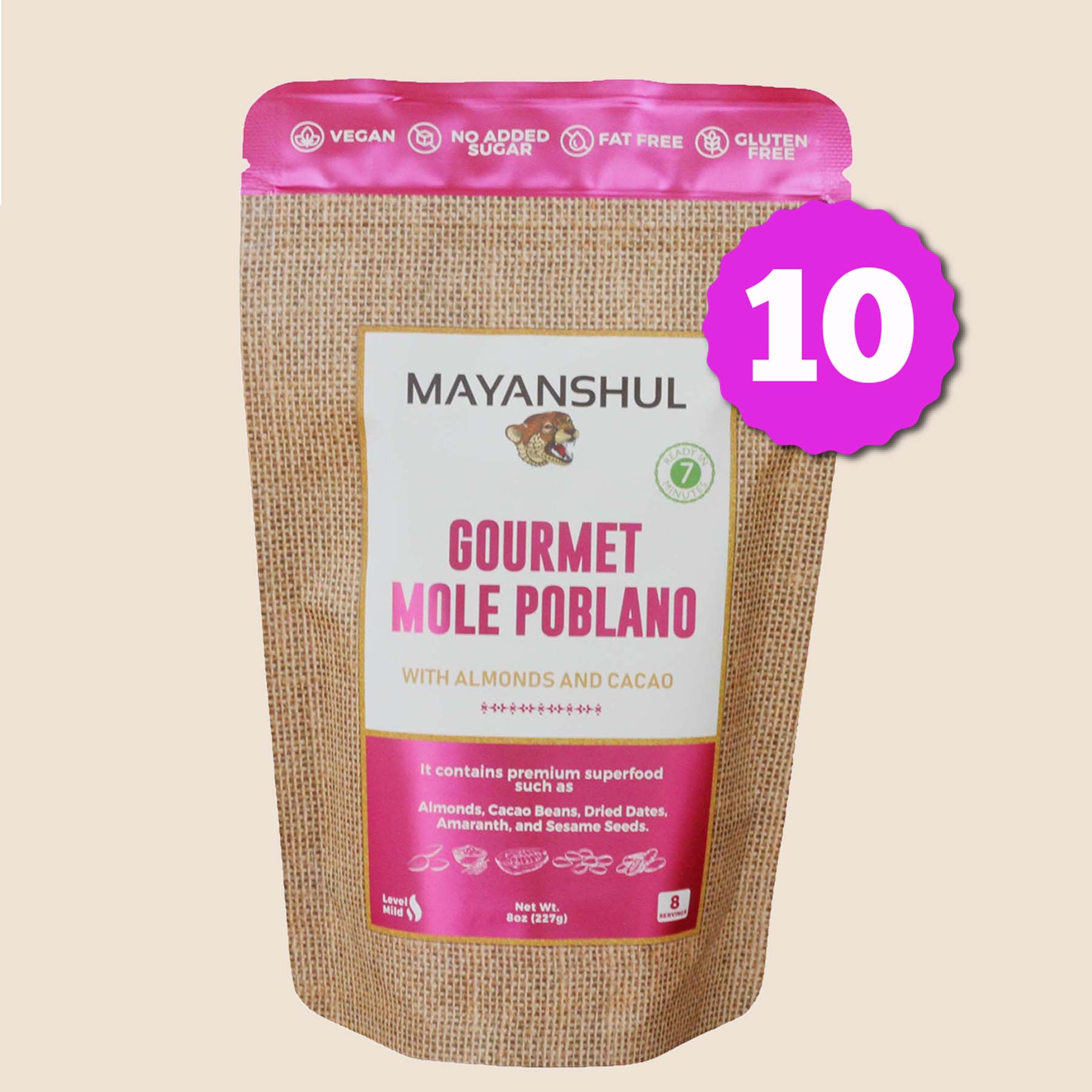 A package of Mayanshul Gourmet Mole Poblano with almonds and cacao, labeled vegan, no added sugar, fat, dairy, and artificial colors or flavors.
