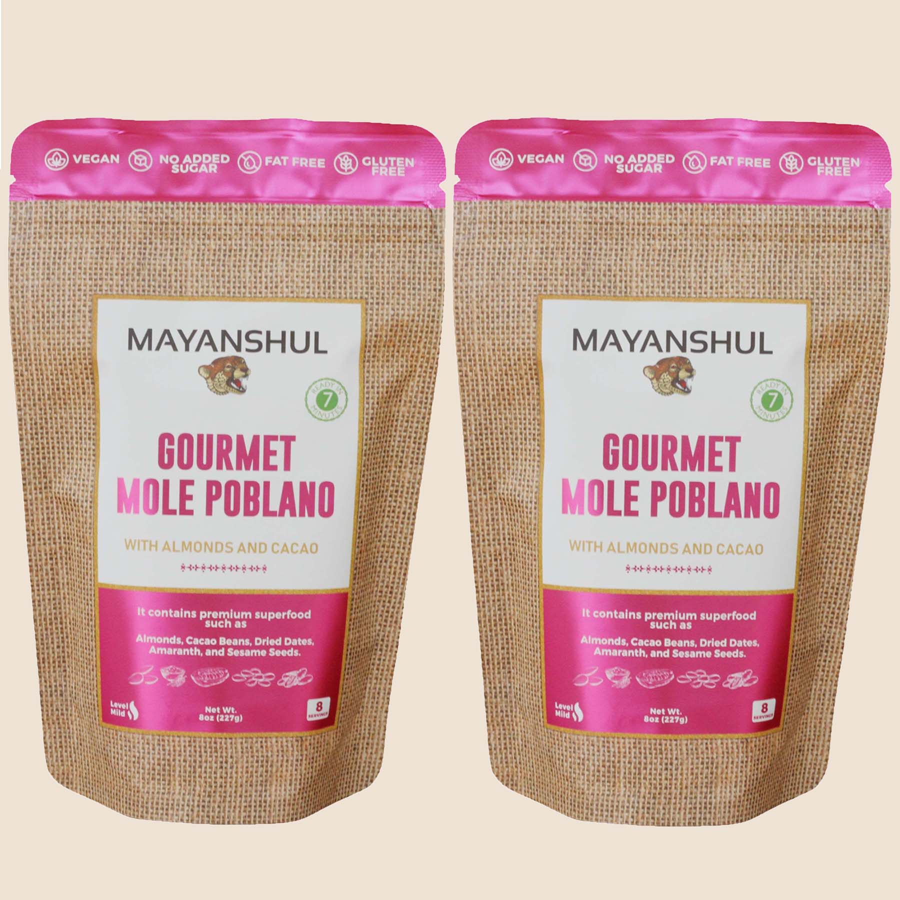 A package of Mayanshul Gourmet Mole Poblano with almonds and cacao, labeled vegan, no added sugar, fat, dairy, and artificial colors or flavors.