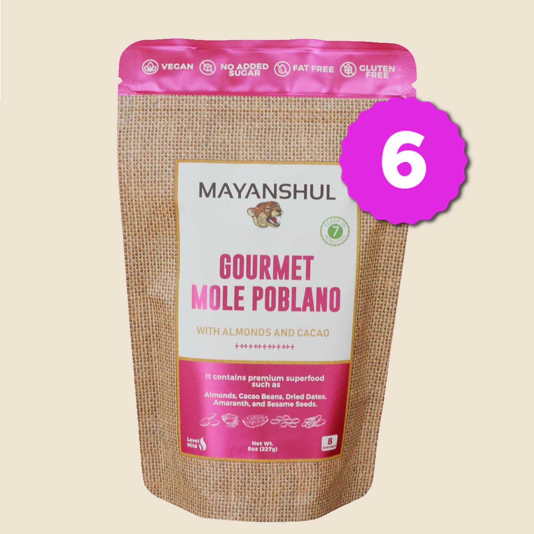 A package of Mayanshul Gourmet Mole Poblano with almonds and cacao, labeled vegan, no added sugar, fat, dairy, and artificial colors or flavors.