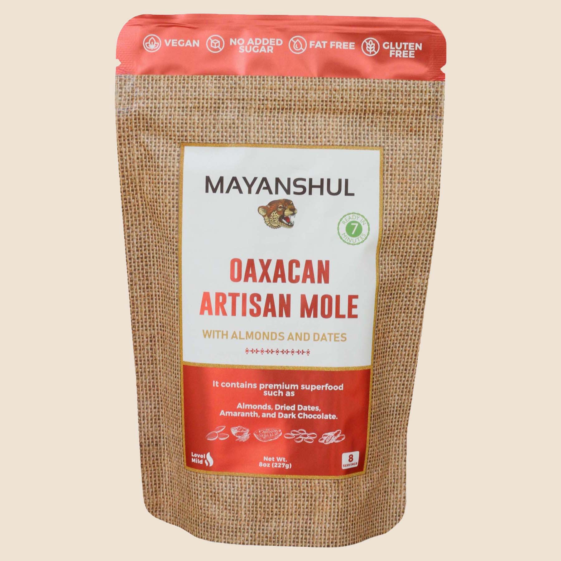 A package of Mayanshul Oaxacan Artisan Mole with almonds and dates, labeled vegan, gluten-free, and fat-free.