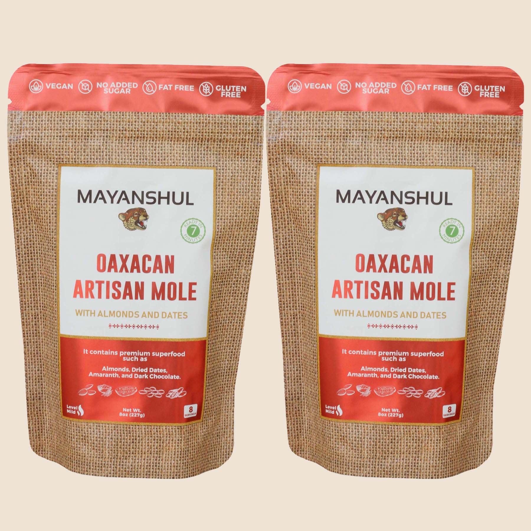 A package of Mayanshul Oaxacan Artisan Mole with almonds and dates, labeled vegan, gluten-free, and fat-free.