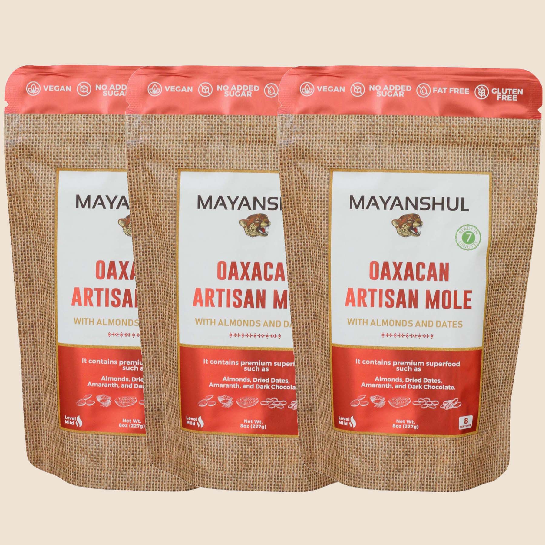 A package of Mayanshul Oaxacan Artisan Mole with almonds and dates, labeled vegan, gluten-free, and fat-free.