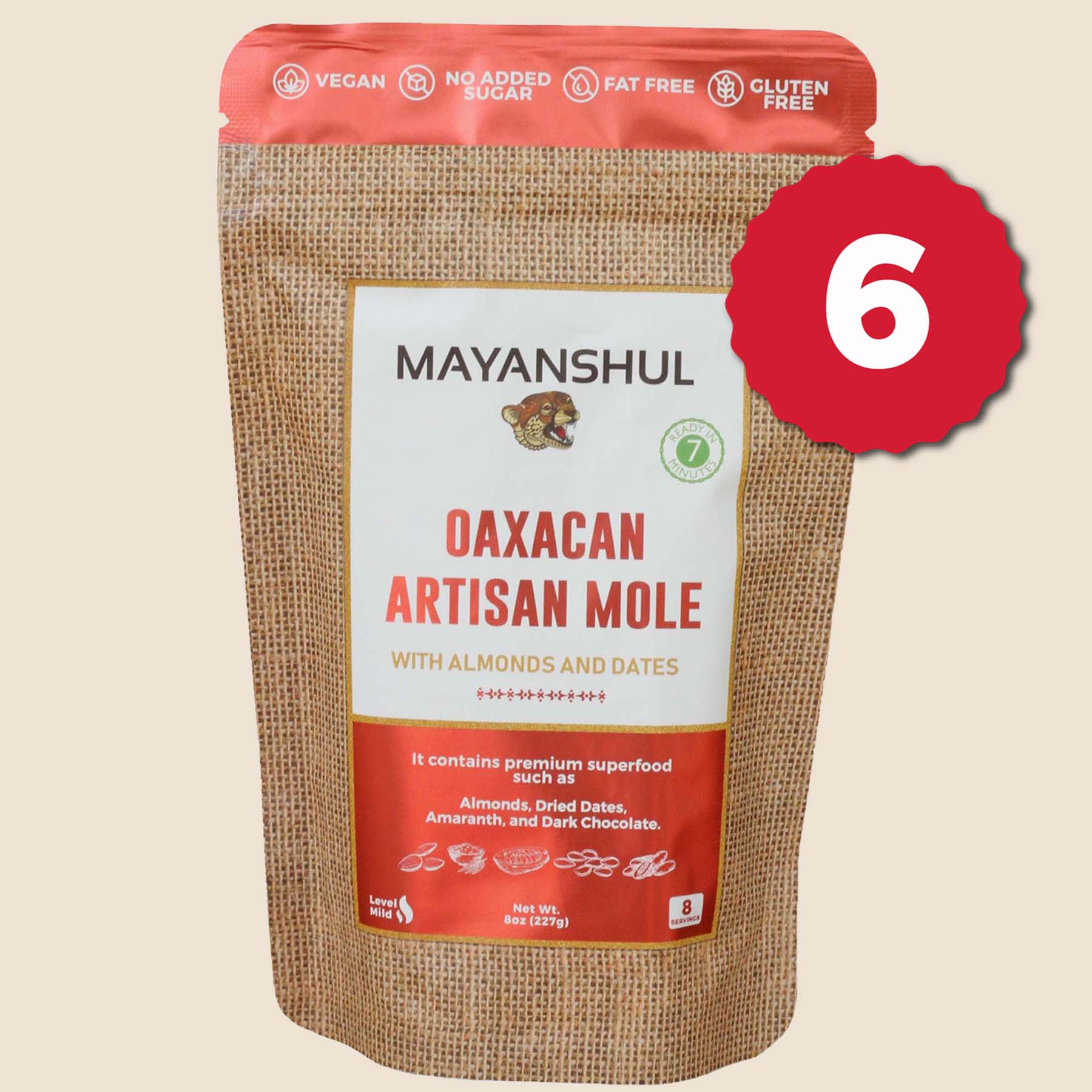 A package of Mayanshul Oaxacan Artisan Mole with almonds and dates, labeled vegan, gluten-free, and fat-free.